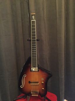Another great Forshage guitar: ergo with harmonic design (I think) humbucker.